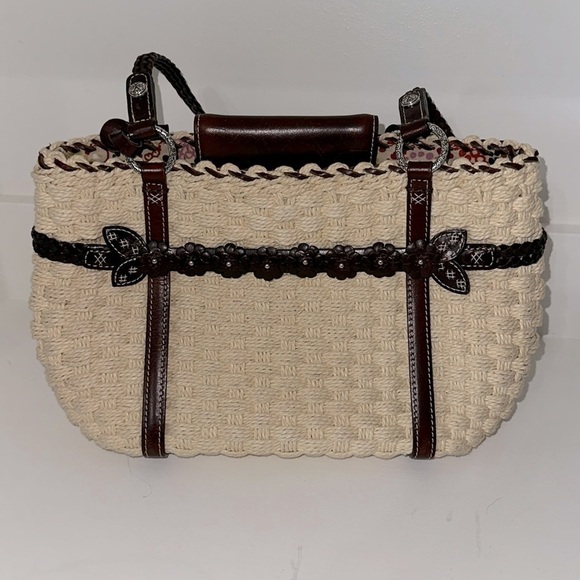 Brighton Woven and Leather Shoulder Bag With Heart Pendant And Floral Accent - Picture 1 of 7